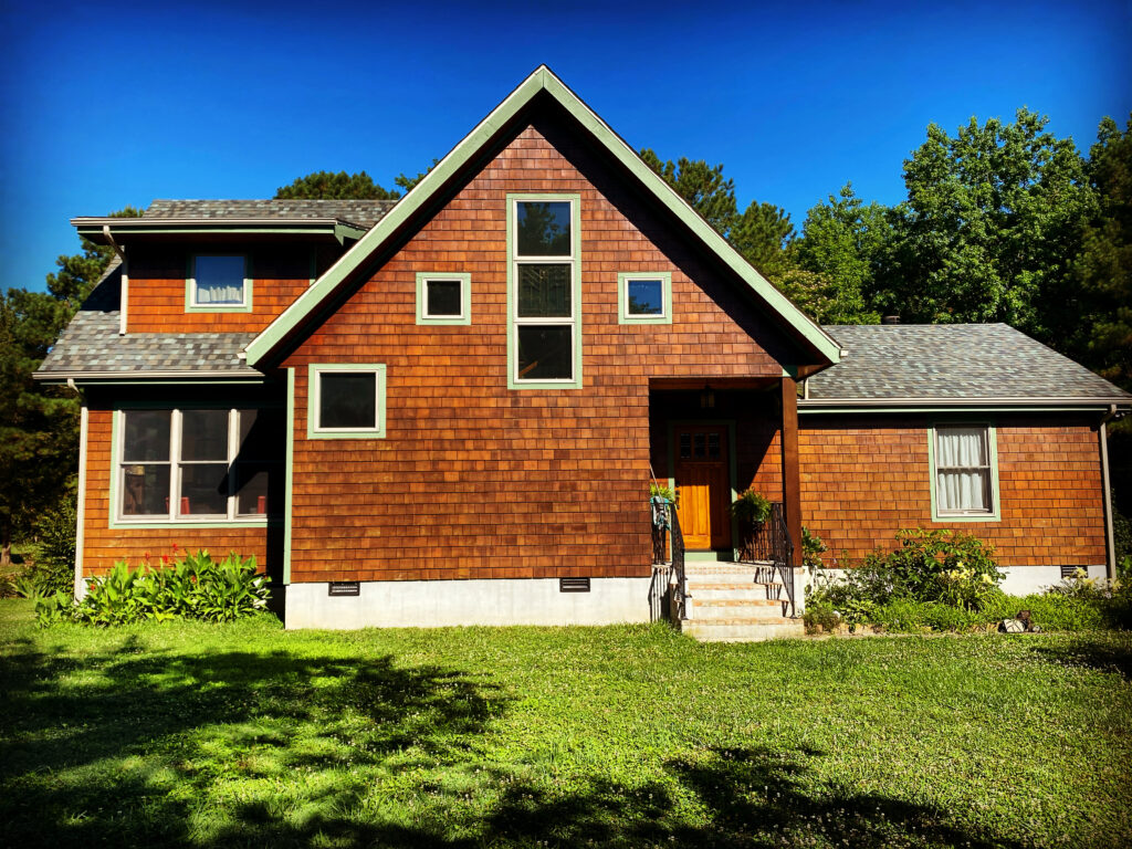 A beautifully constructed brown house.